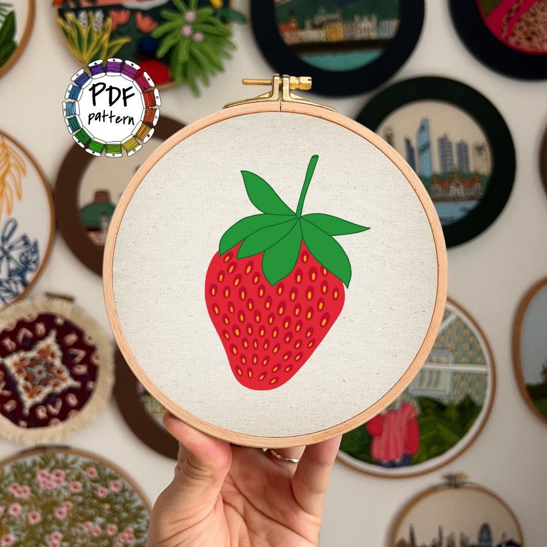 Strawberry hand embroidery pattern PDF, beginner-friendly, with colorful design in a hoop.