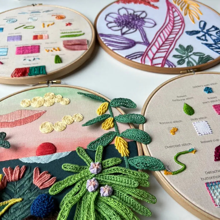 Popular bestselling embroidery patterns collection displayed in finished hoops