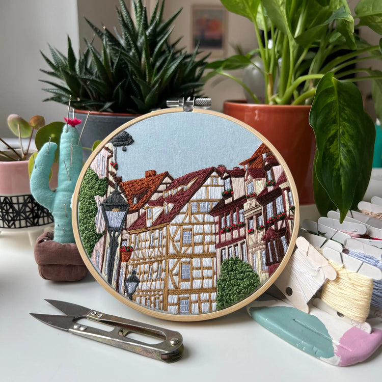 Intermediate level hand embroidery pattern with detailed stitching in display hoop