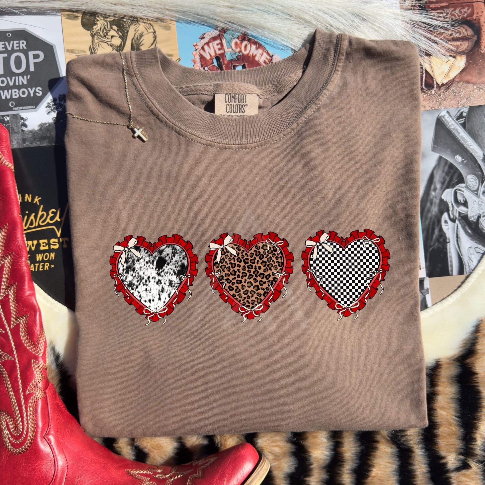 Embroidery hoop with embroidered horses on a light fabric background