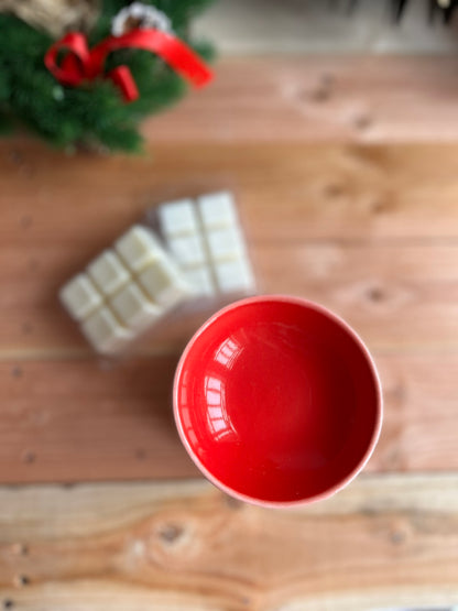 Decorative shisha embroidery on the carousel roof with red and white patterns on a gray felt background